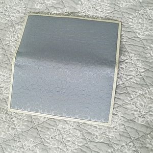 Coach checkbook cover